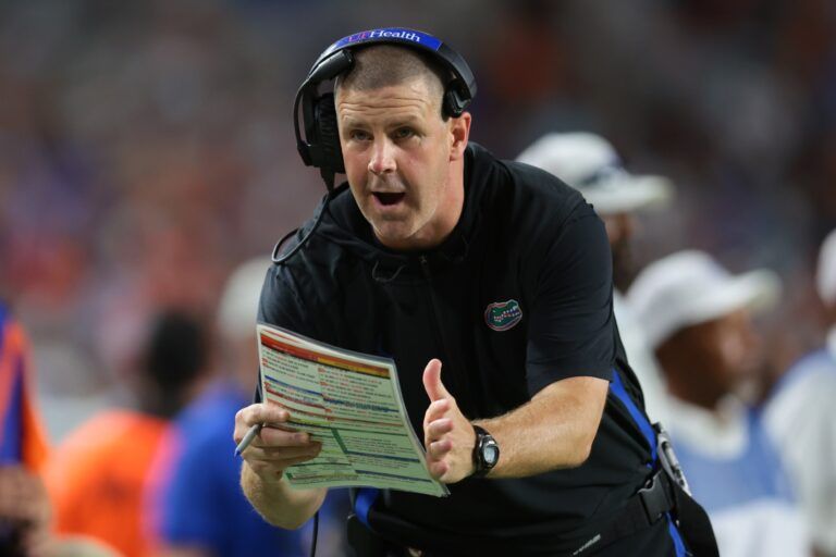 Florida Gators head coach Billy Napier call for a timeout against the Miami Hurricanes during the fourth quarter at Hard Rock Stadium.
