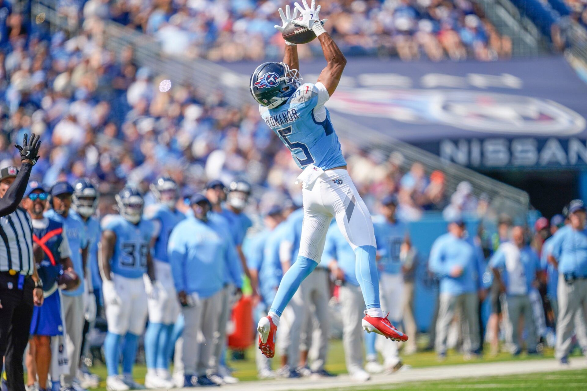 Tennessee Titans wide receiver Elic Ayomanor (5) receives a pass during the fourth quarter against the Indianapolis Colts at Nissan Stadium in Nashville, Tenn., Sunday, Sept. 21, 2025.
