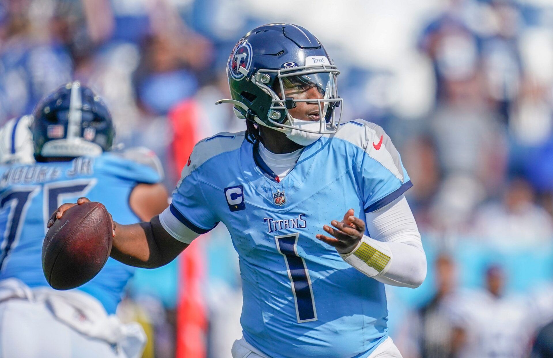 Tennessee Titans quarterback Cam Ward (1) looks for a receiver through the Indianapolis Colts defense during the fourth quarter at Nissan Stadium in Nashville, Tenn., Sunday, Sept. 21, 2025.