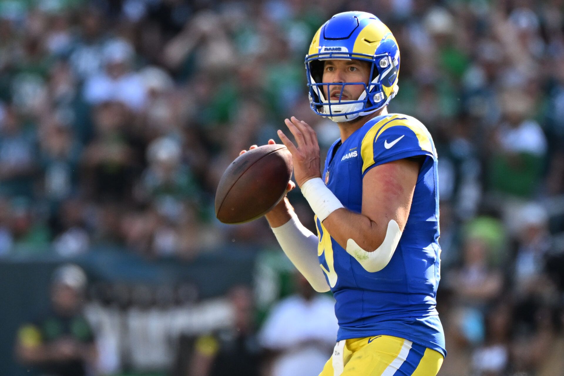 Los Angeles Rams quarterback Matthew Stafford (9) looks for a receiver during the fourth quarter against the Philadelphia Eagles at Lincoln Financial Field.