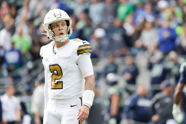 New Orleans Saints quarterback Spencer Rattler (2) looks at the scoreboard in between plays against the Seattle Seahawks at Lumen Field.