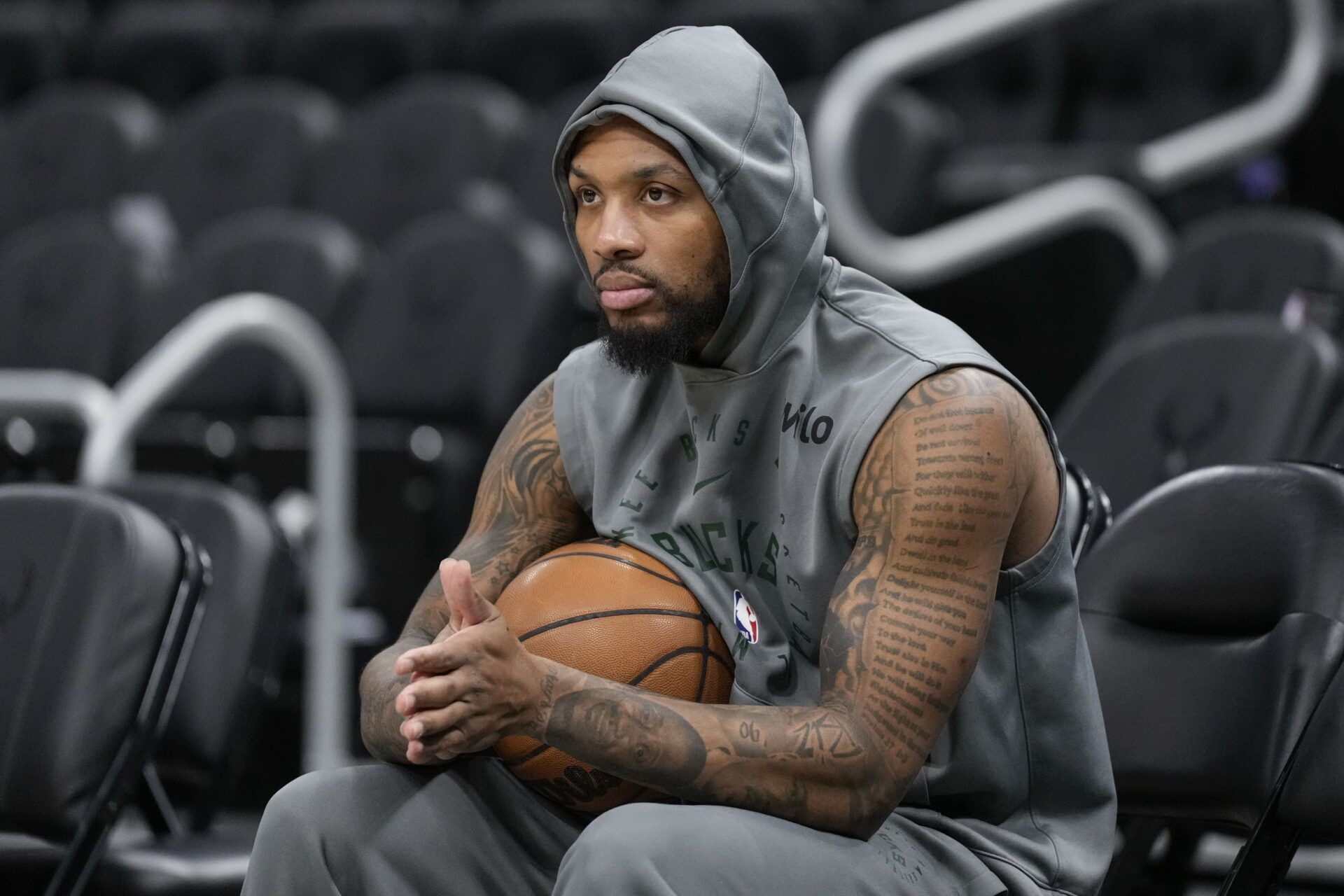 Milwaukee Bucks guard Damian Lillard (0) looks on during warmups prior to the game against the Orlando Magic at Fiserv Forum.