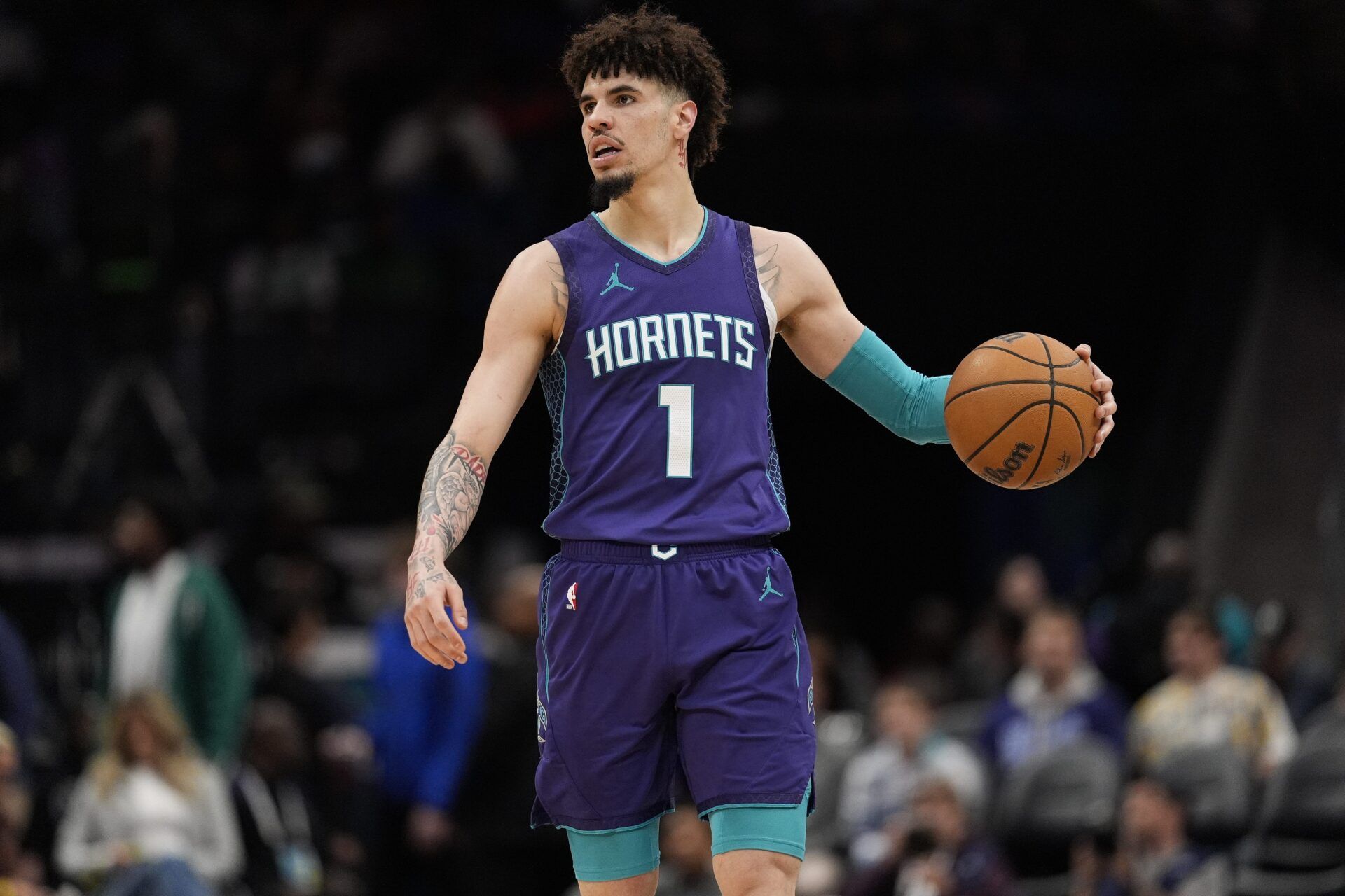 Charlotte Hornets guard LaMelo Ball (1) handles the ball against the New York Knicks during the second half at Spectrum Center.