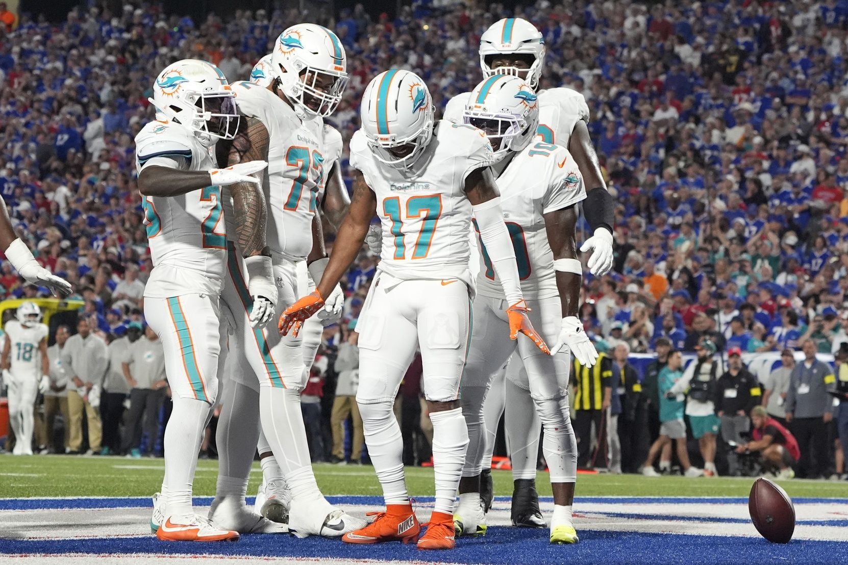 Miami Dolphins wide receiver Jaylen Waddle (17) celebrates after scoring a touchdown against the Buffalo Bills in the second quarter at Highmark Stadium.