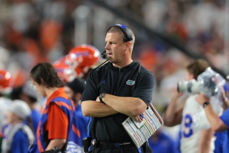 Florida Gators head coach Billy Napier watches from the sideline against the Miami Hurricanes during the second quarter at Hard Rock Stadium.