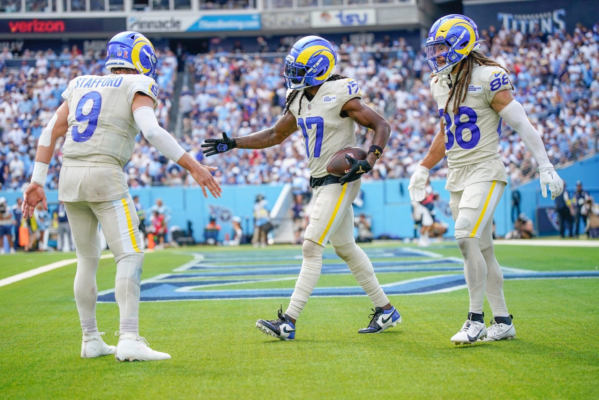 Los Angeles Rams wide receiver Davante Adams (17) celebrates his touchdown against the Tennessee Titans during the fourth quarter at Nissan Stadium in Nashville, Tenn., Sunday, Sept. 14, 2025.
