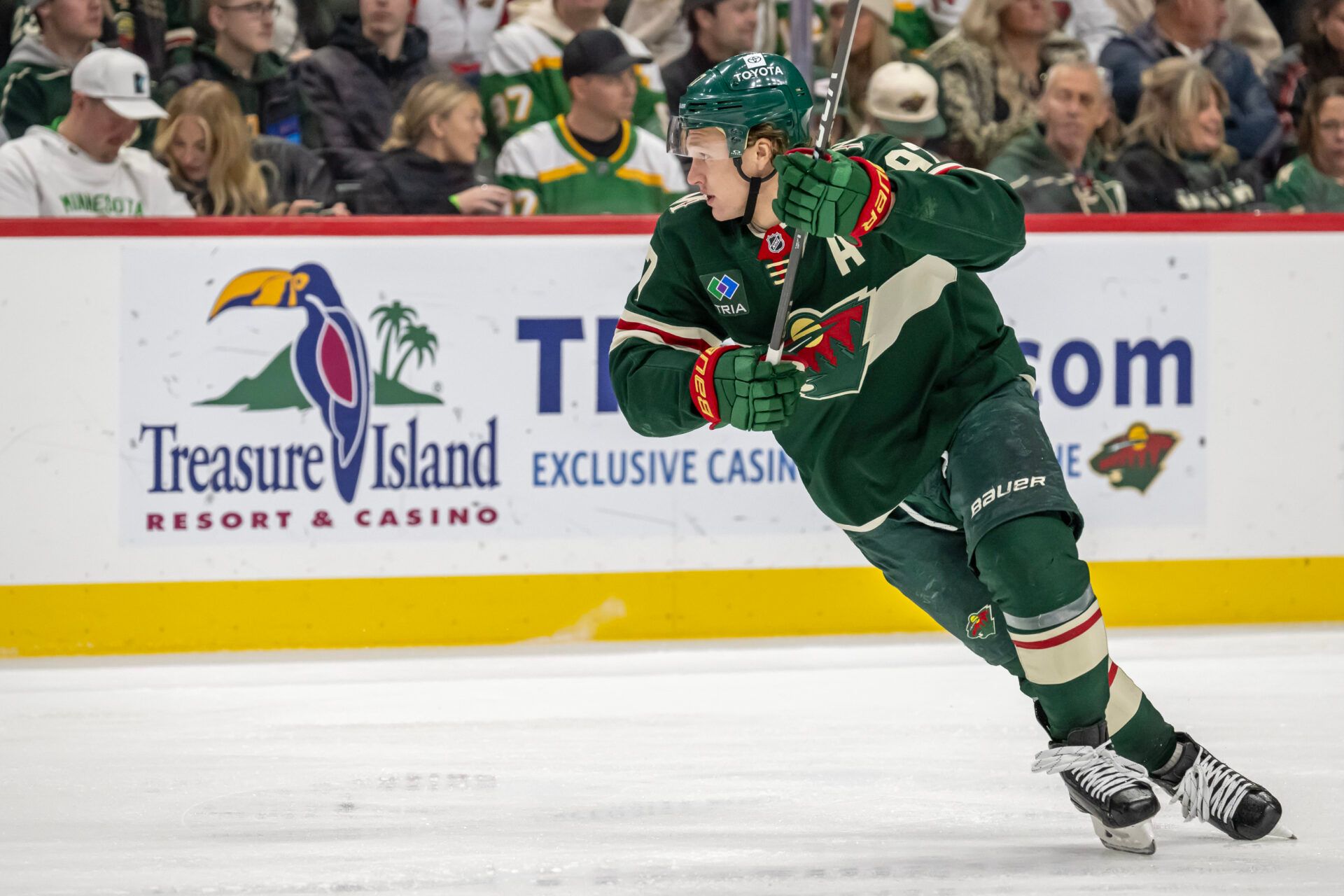 Minnesota Wild forward Kirill Kaprizov (97) moves up ice against the Utah Hockey Club during the second period at Xcel Energy Center.