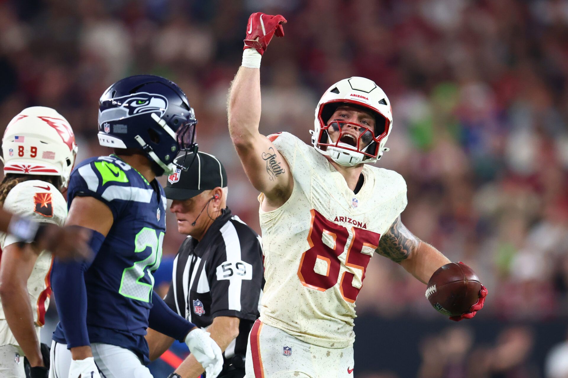 Arizona Cardinals tight end Trey McBride (85) reacts in the first half against the Seattle Seahawks at State Farm Stadium.