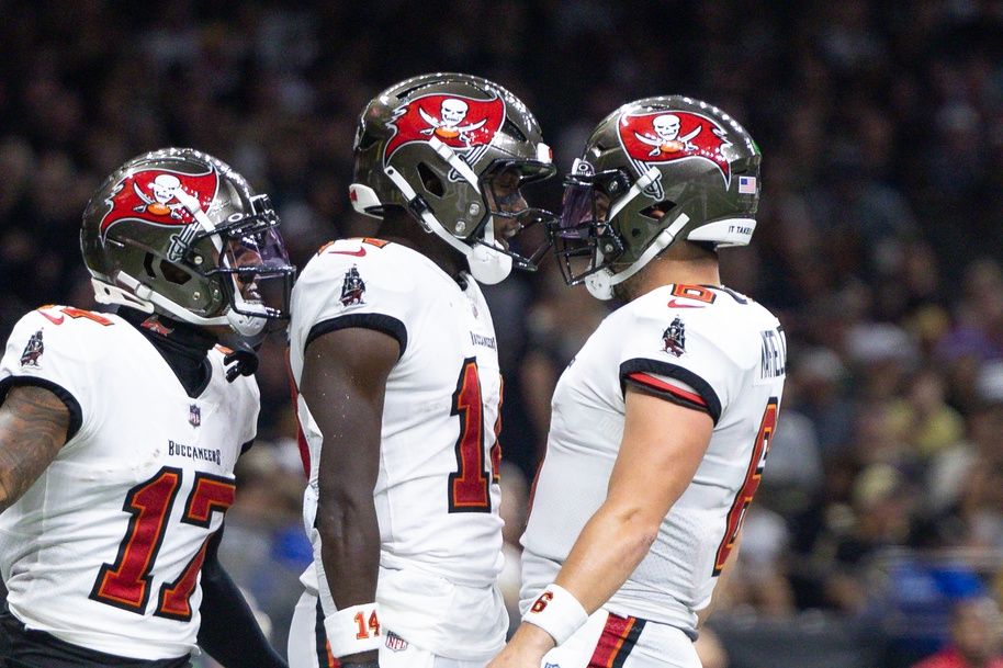 Tampa Bay Buccaneers wide receiver Chris Godwin (14) and quarterback Baker Mayfield (6) celebrate a touchdown against the New Orleans Saints during he first half at Caesars Superdome.
