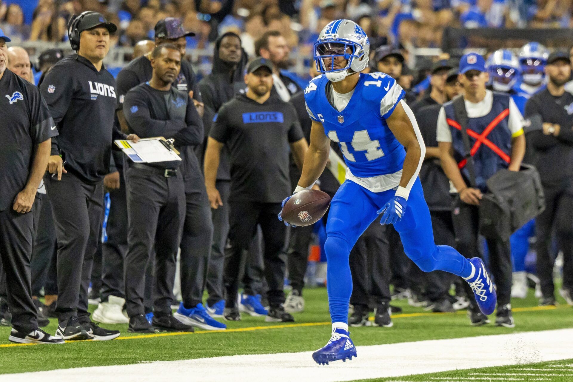 Detroit Lions wide receiver Amon-Ra St. Brown (14) runs for a touchdown during the first half against the Cleveland Browns at Ford Field.