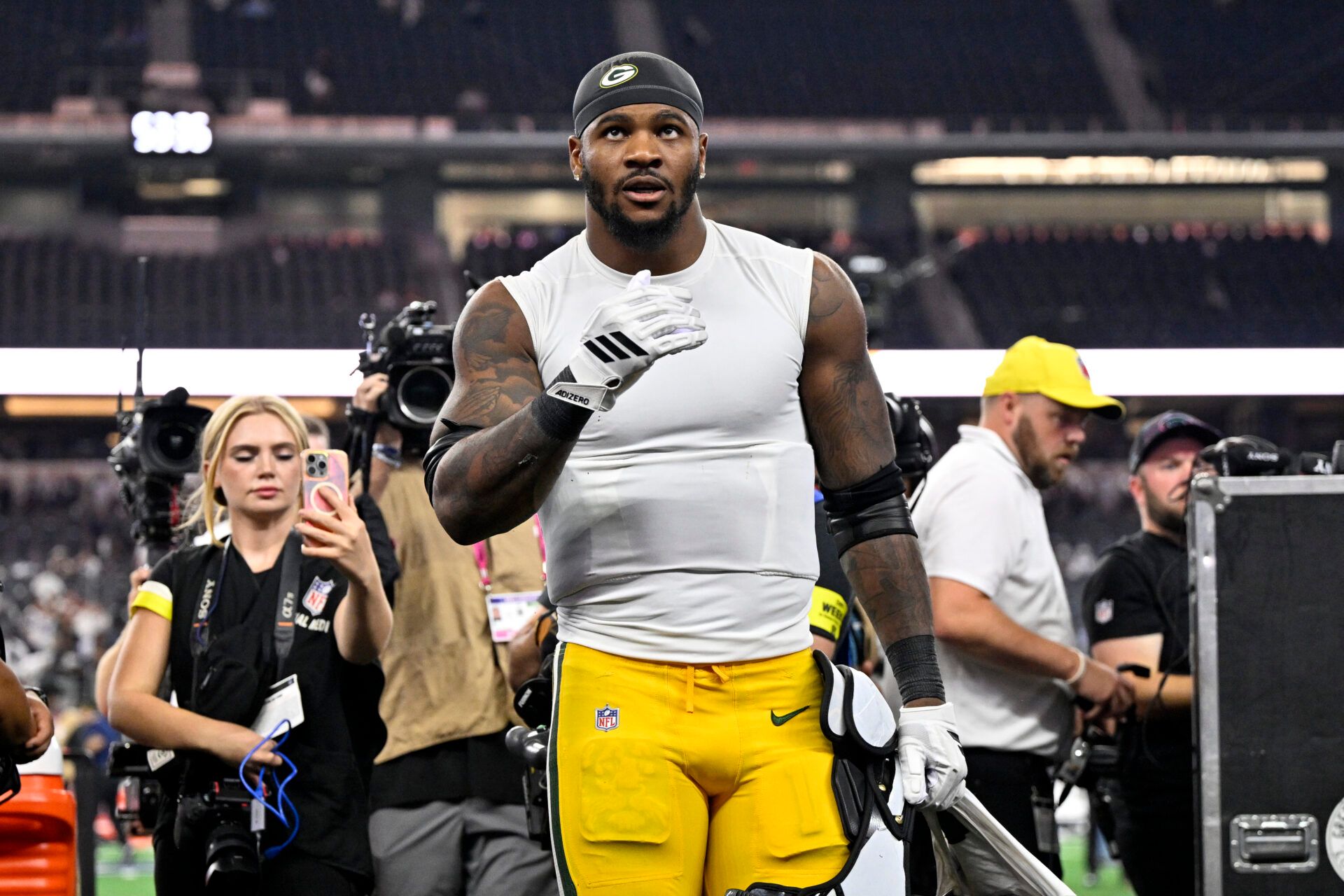 Green Bay Packers defensive end Micah Parsons (1) leaves the field after the game ended in a tie at AT&T Stadium.