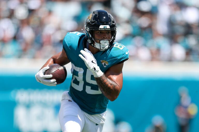 Jacksonville Jaguars tight end Brenton Strange (85) runs with the ball against the Carolina Panthers in the first quarter at EverBank Stadium.