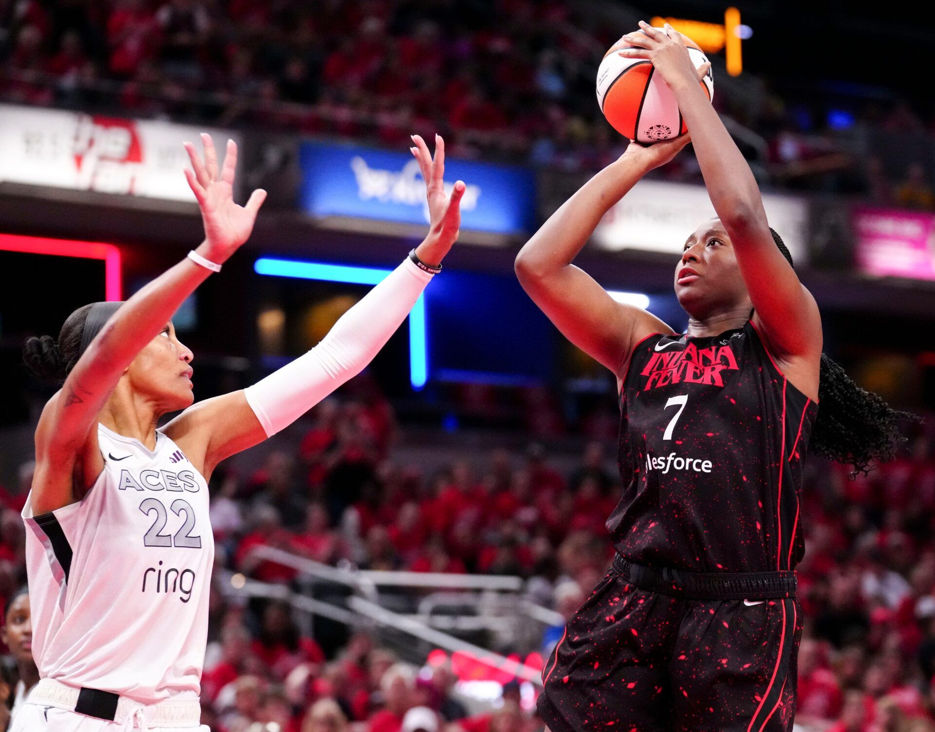 Las Vegas Aces center A'ja Wilson (22) defends Indiana Fever forward Aliyah Boston (7) during Game 4 of the WNBA semifinals on Sunday, Sept. 28, 2025, at Gainbridge Fieldhouse in Indianapolis. The Fever defeated the Aces 90-83.