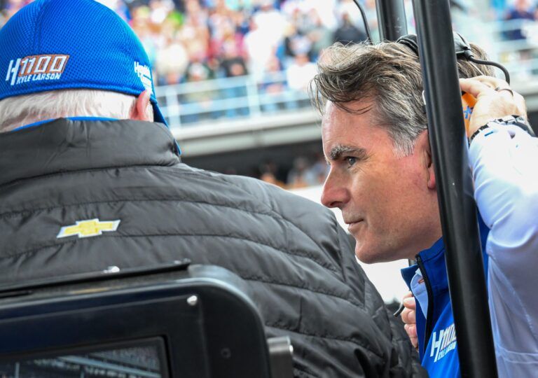 Jeff Gordon, right, chats with Rick Hendrick, left, the owner of Hendrick Motorsports, Sunday, May 25, 2025, during the 109th running of the Indianapolis 500 at Indianapolis Motor Speedway.