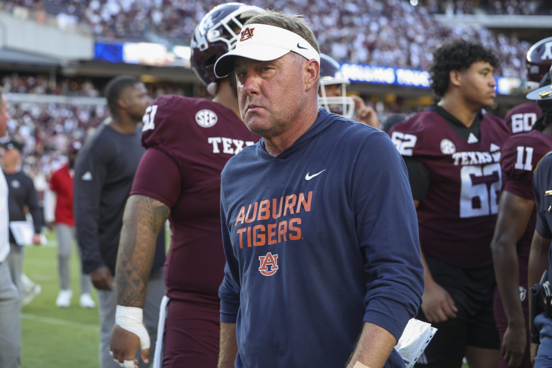 Auburn Tigers head coach Hugh Freeze walks off the field after the game against the Texas A&M Aggies at Kyle Field.