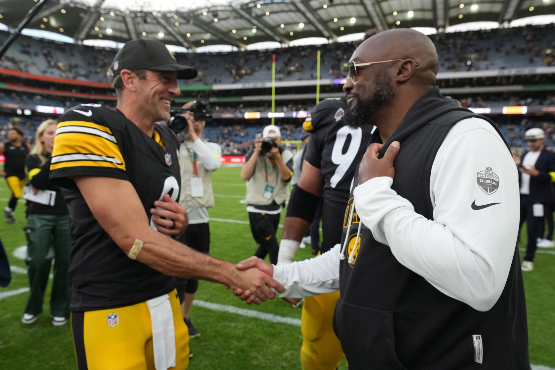 Pittsburgh Steelers quarterback Aaron Rodgers (8) and coach Mike Tomlin shake hands after an NFL International Series game against the Minnesota Vikings at Croke Park.