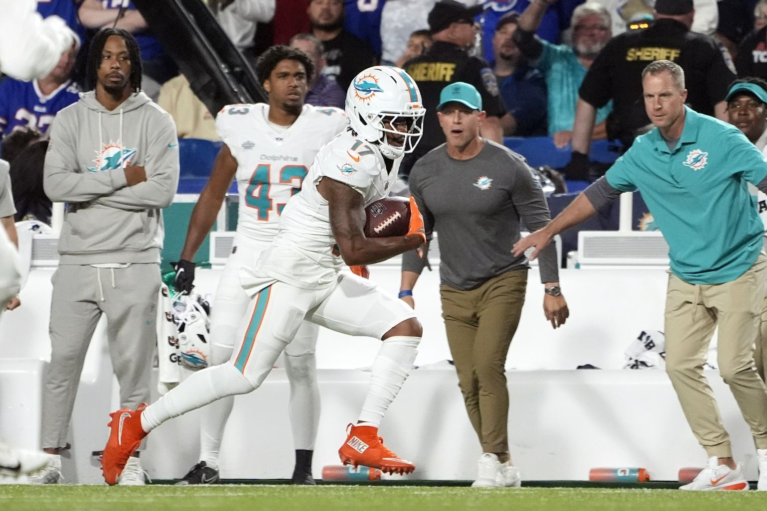 Miami Dolphins wide receiver Jaylen Waddle (17) runs against the Buffalo Bills in the fourth quarter at Highmark Stadium.