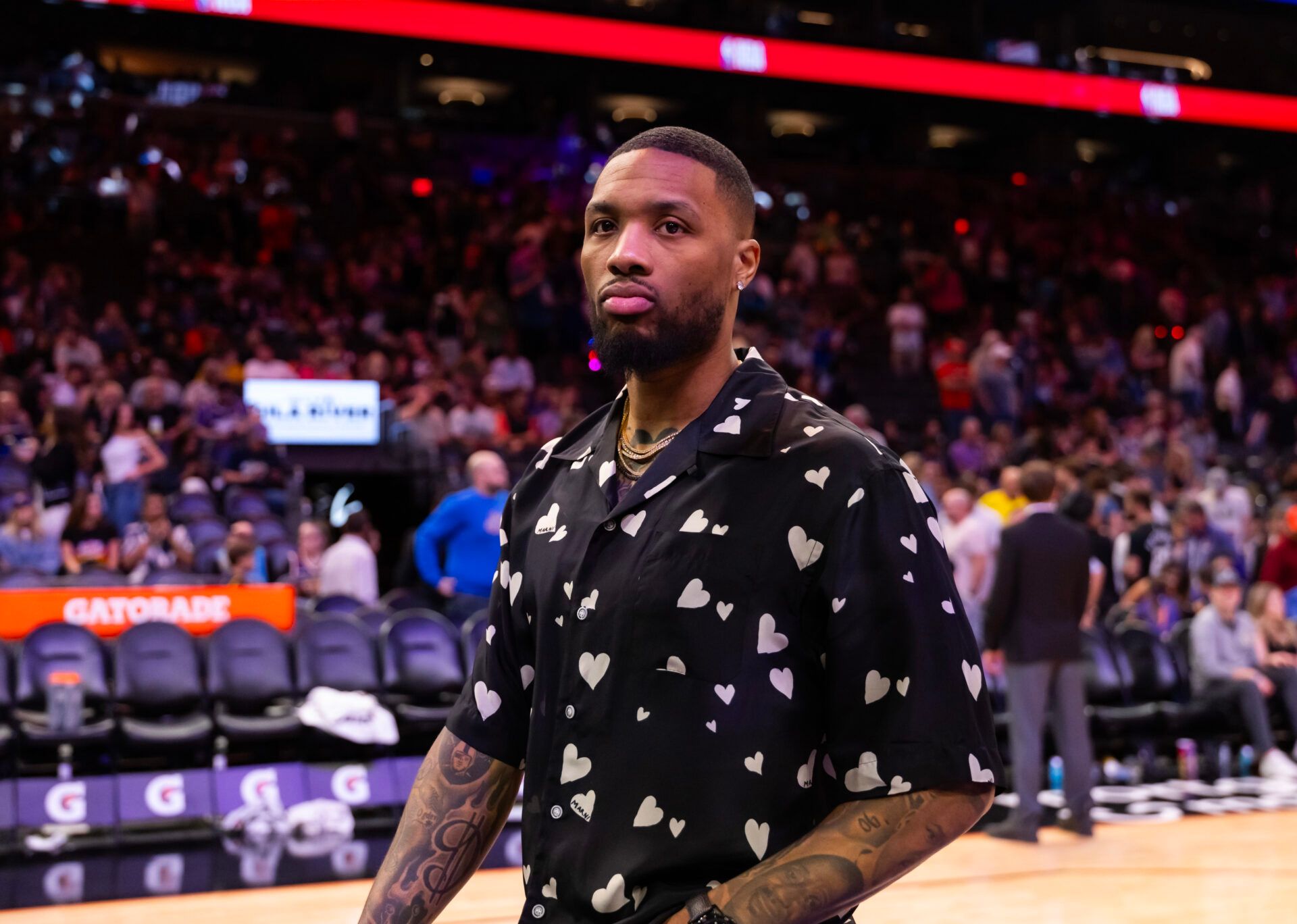 Milwaukee Bucks injured guard Damian Lillard against the Phoenix Suns at Footprint Center.