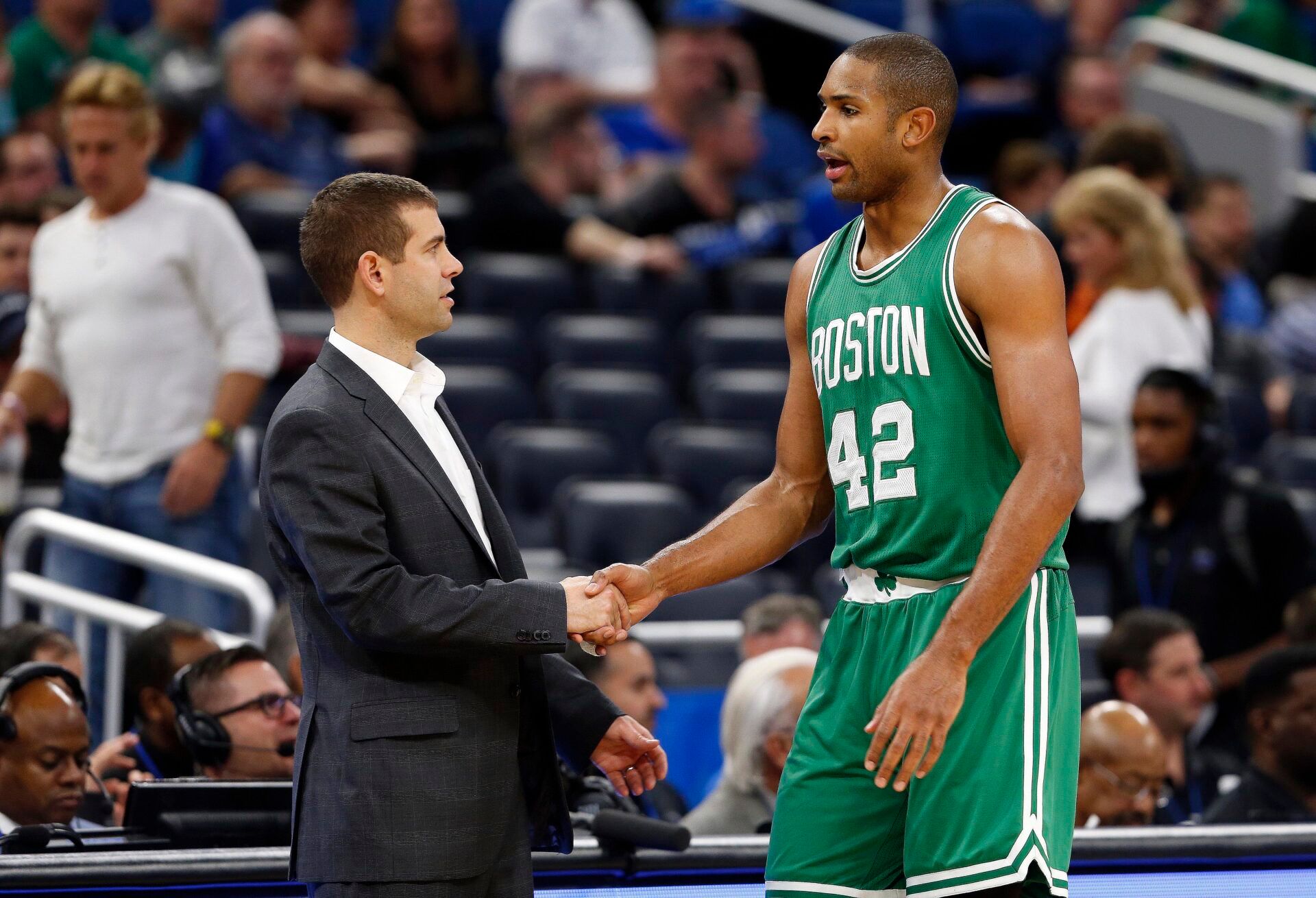 Boston Celtics head coach Brad Stevens and Boston Celtics center Al Horford (42) hand shake during the second half against the Orlando Magic at Amway Center. Boston Celtics defeated the Orlando Magic 117-87.