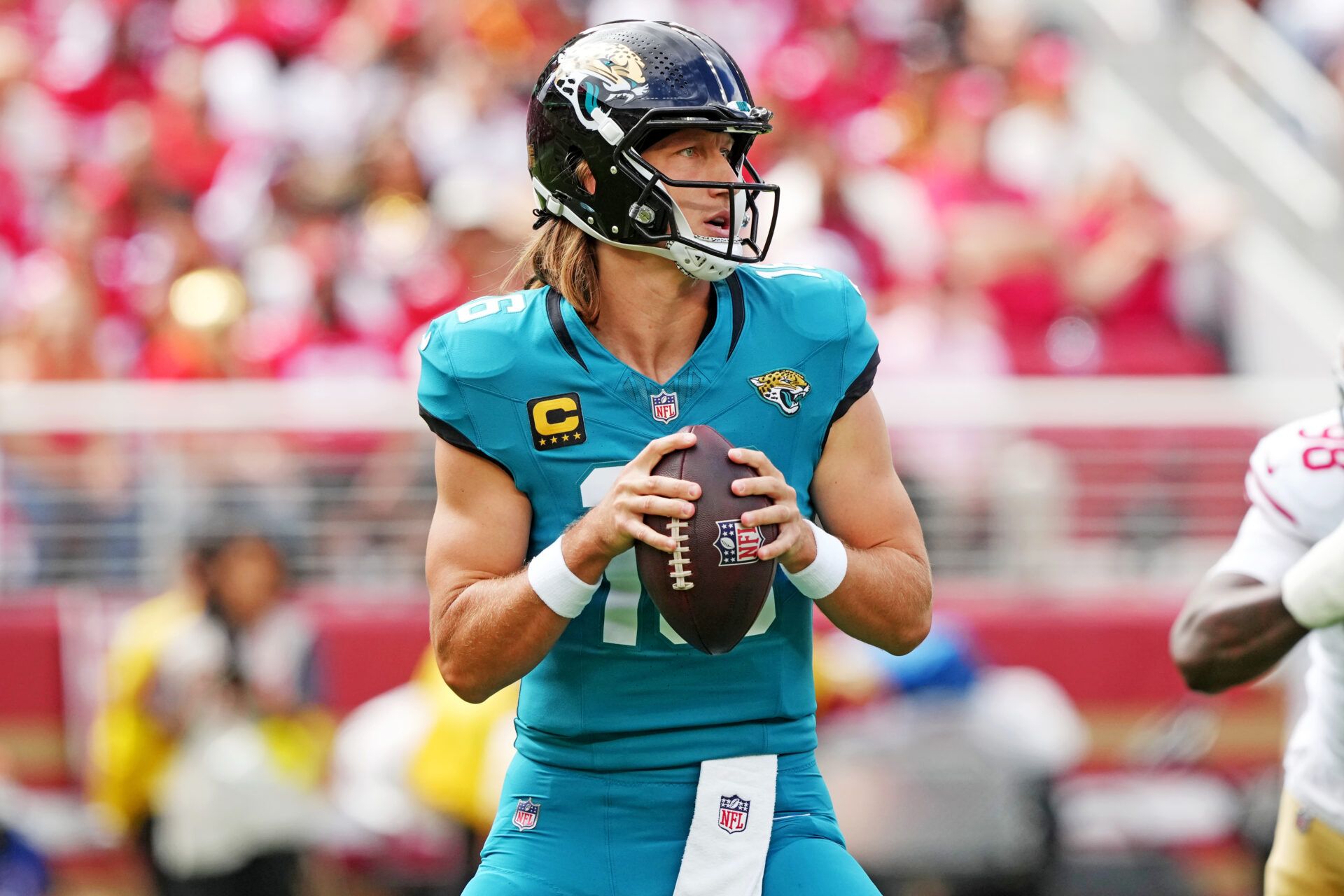 Jacksonville Jaguars quarterback Trevor Lawrence (16) drops back for a pass during the first half against the San Francisco 49ers at Levi's Stadium.