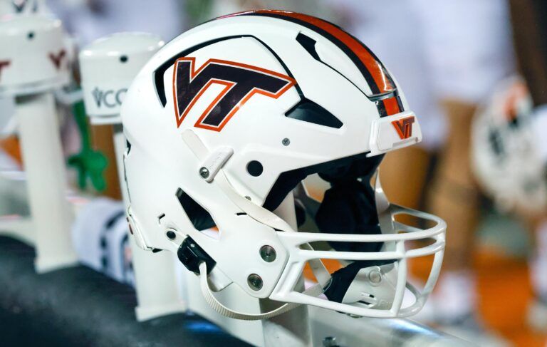 A Virginia Tech Hokies helmet sits near the team bench during the first quarter against the Boston College Eagles at Lane Stadium.