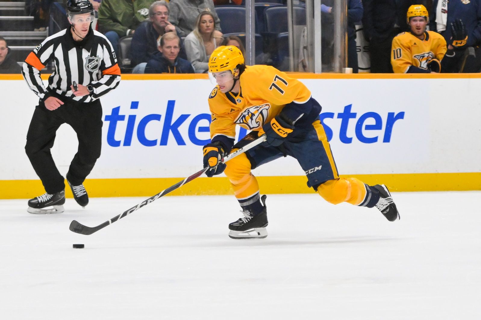 Nashville Predators right wing Luke Evangelista (77) skates with the puck against the St. Louis Blues during the second period at Bridgestone Arena.