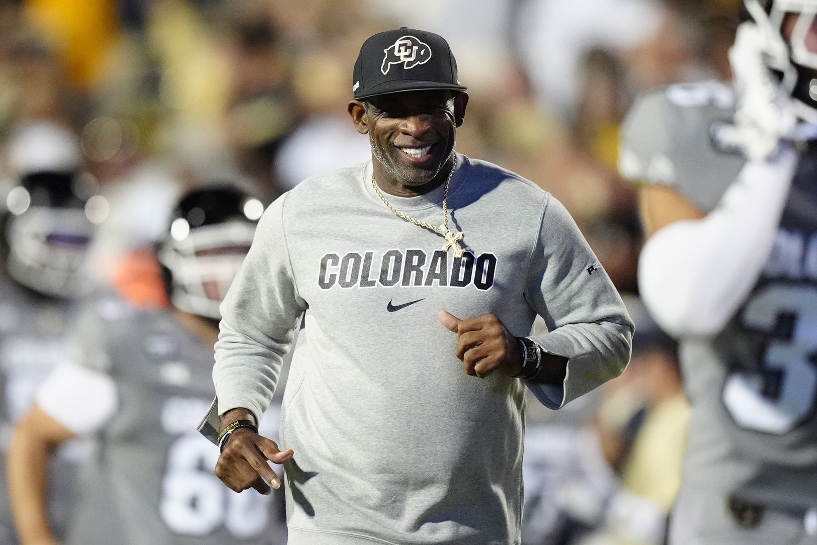 Colorado Buffaloes head coach Deion Sanders reacts before the game against the Brigham Young Cougars at Folsom Field.