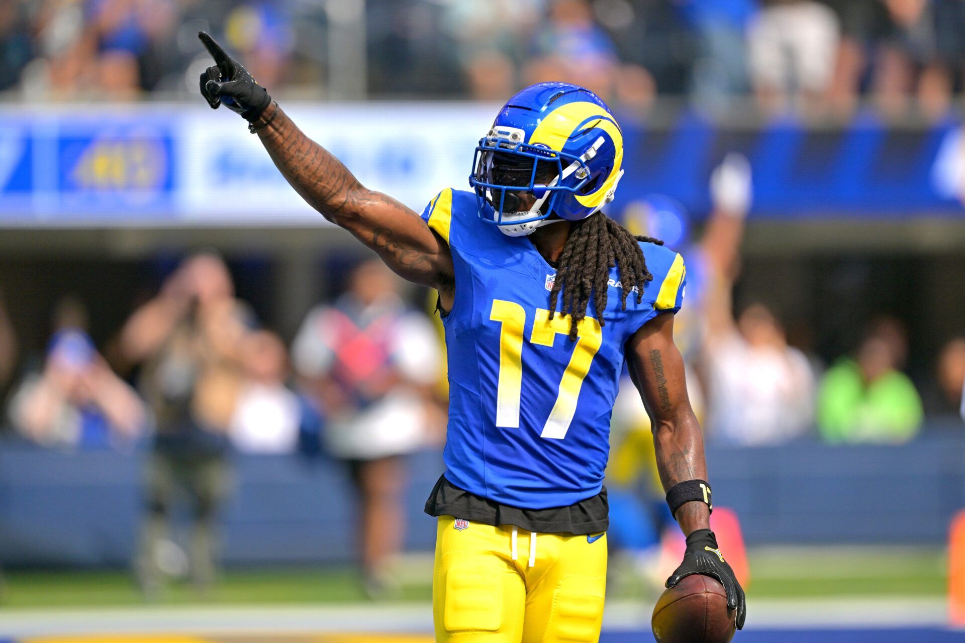 Los Angeles Rams wide receiver Davante Adams (17) celebrates after a touchdown in the first half against the Indianapolis Colts at SoFi Stadium.