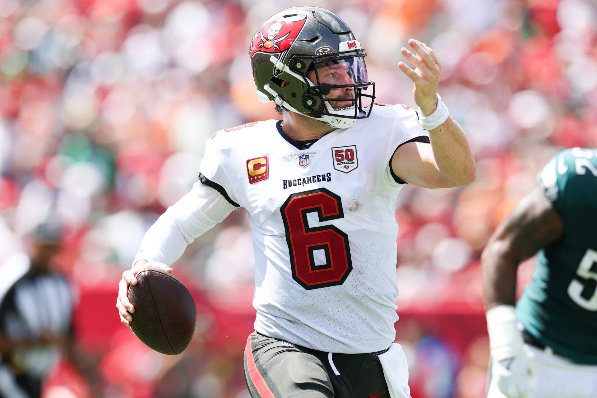 Tampa Bay Buccaneers quarterback Baker Mayfield (6) runs with the ball during the second quarter against the Philadelphia Eagles at Raymond James Stadium.