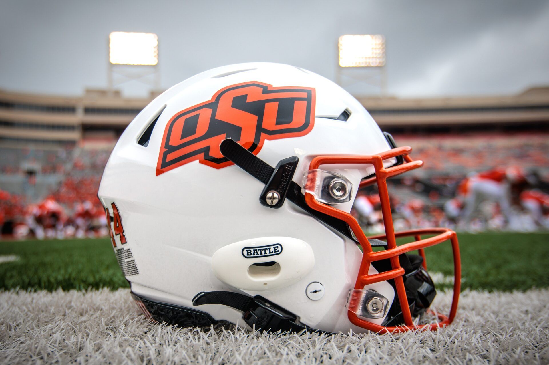 Oklahoma State Cowboys helmet sits on the field prior to the game against the South Dakota State Jackrabbits at Boone Pickens Stadium.