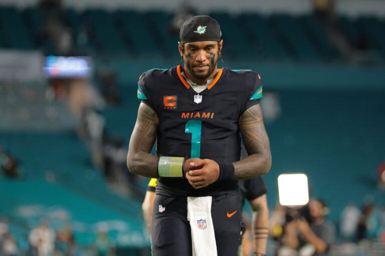 Miami Dolphins quarterback Tua Tagovailoa (1) walks off the field  after the game against the New York Jets at Hard Rock Stadium.