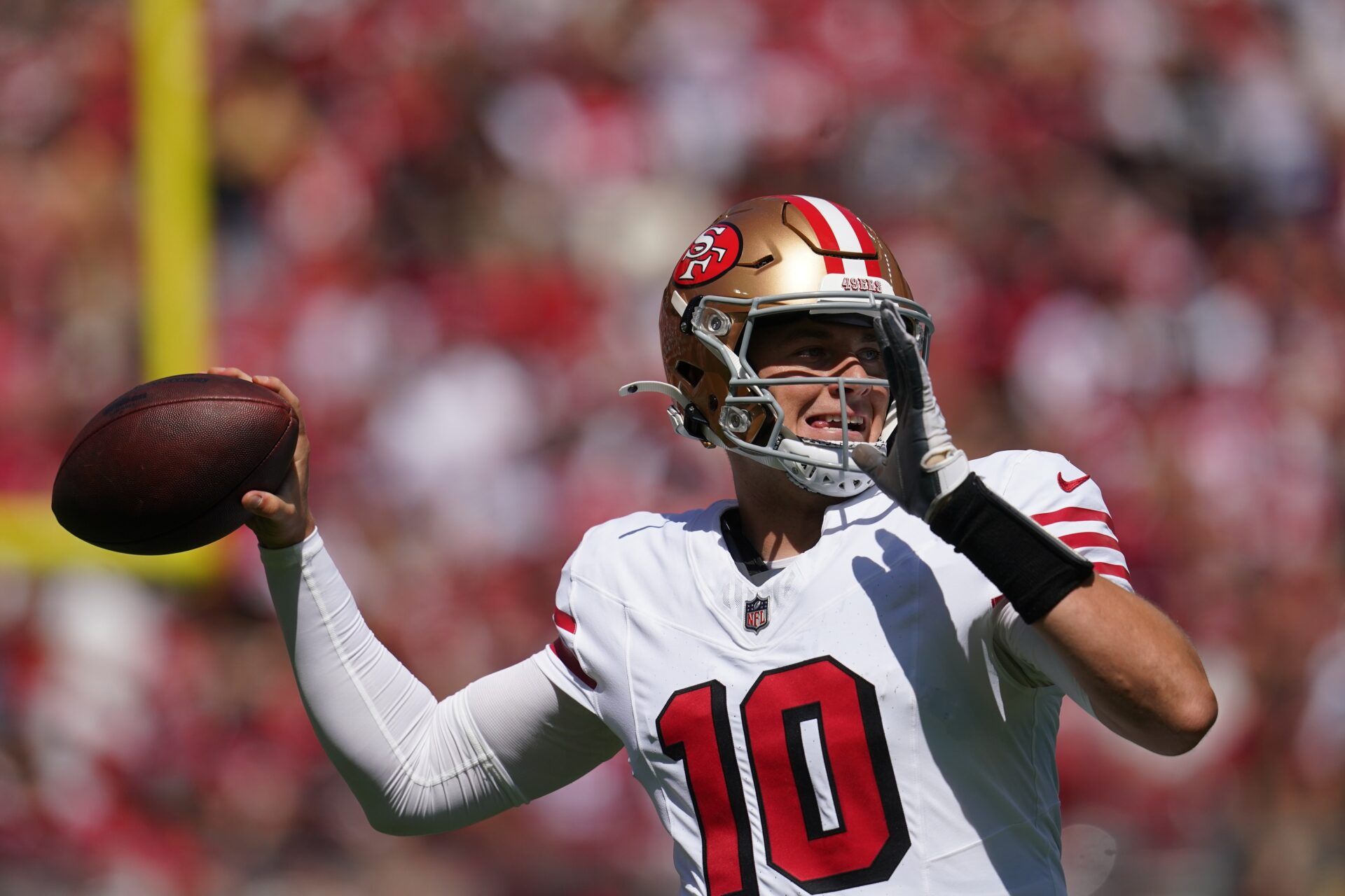 San Francisco 49ers quarterback Mac Jones (10) throws downfield against the Arizona Cardinals during the first half at Levi's Stadium.