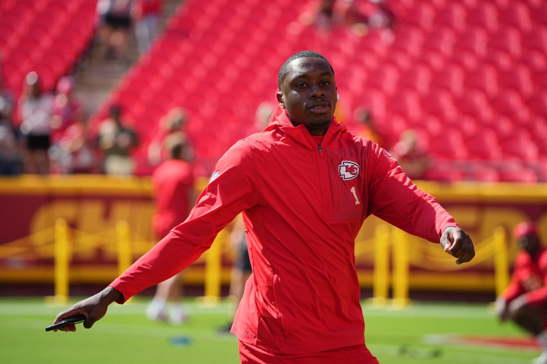 Kansas City Chiefs wide receiver Xavier Worthy (1) warms up before the game against the Baltimore Ravens at GEHA Field at Arrowhead Stadium.