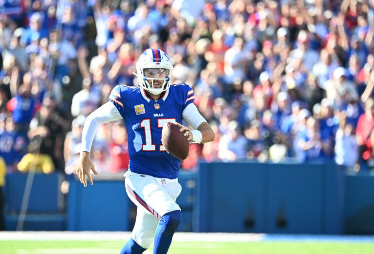 Buffalo Bills quarterback Josh Allen (17) runs for a gain during the fourth quarter against the New Orleans Saints at Highmark Stadium.