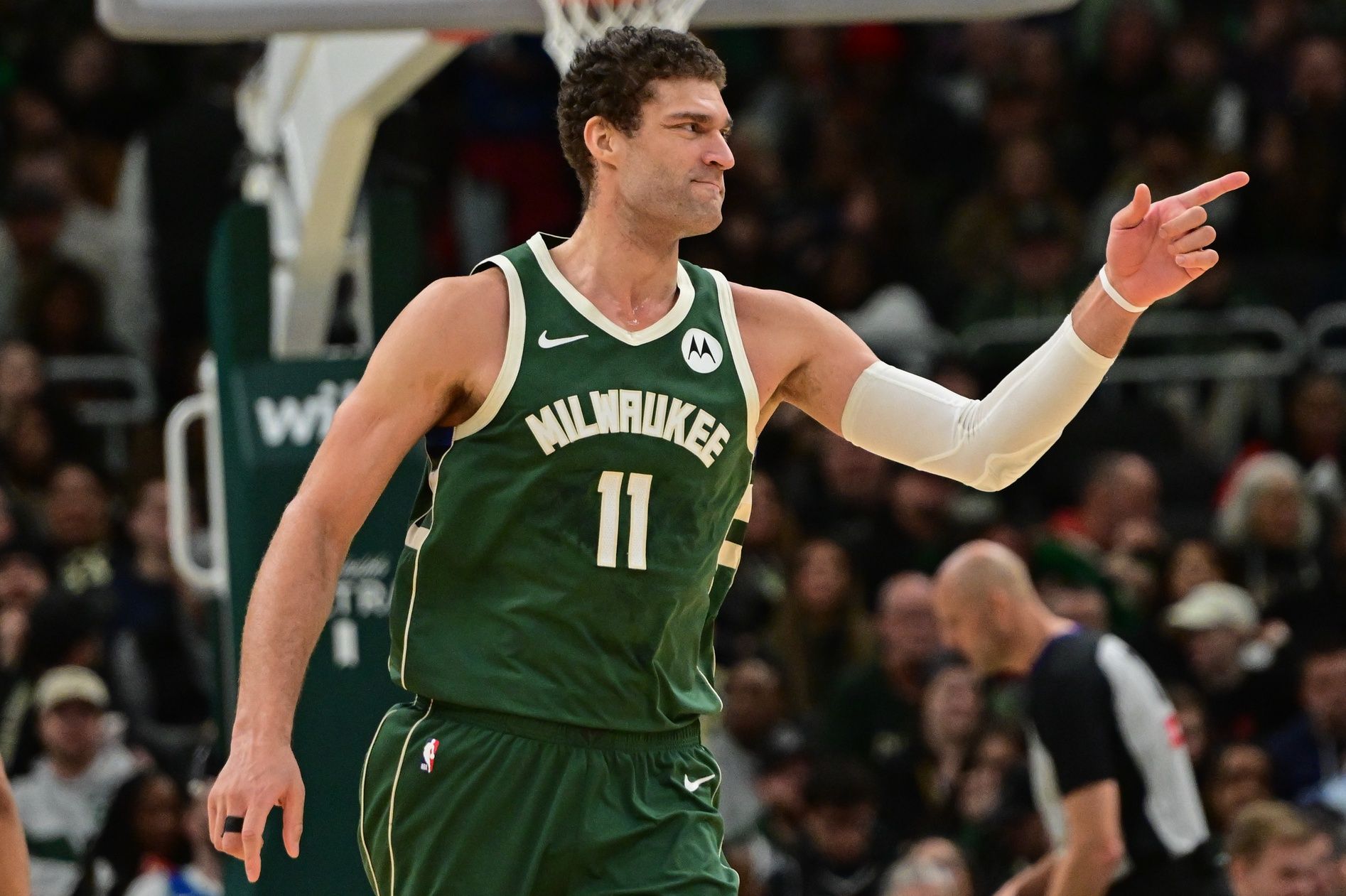 Milwaukee Bucks center Brook Lopez (11) reacts in the fourth quarter against the Washington Wizards at Fiserv Forum.