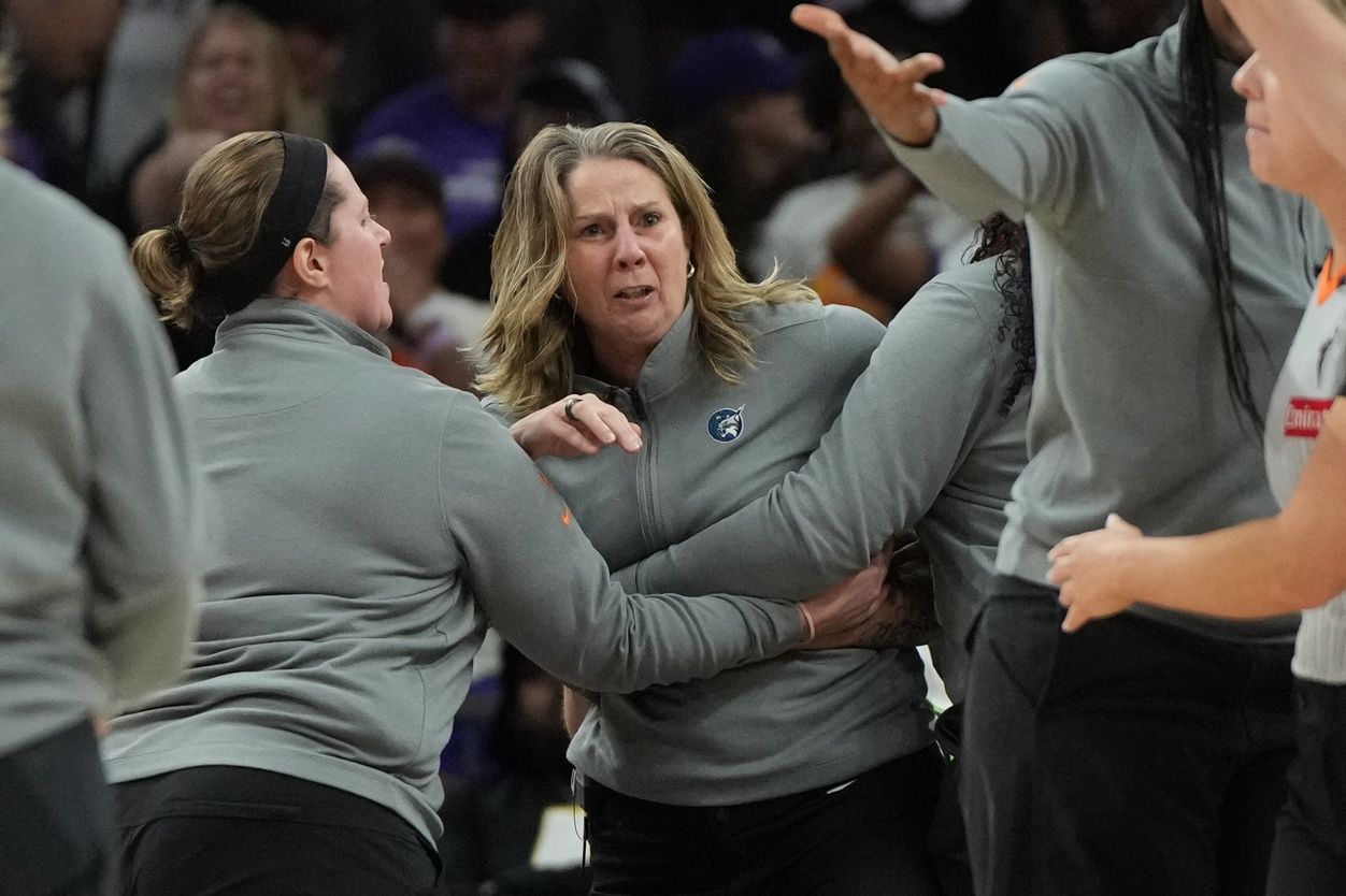 Minnesota Lynx head coach Cheryl Reeve is held back after being ejected during game three against the Phoenix Mercury of the second round for the 2025 WNBA Playoffs at PHX Arena.