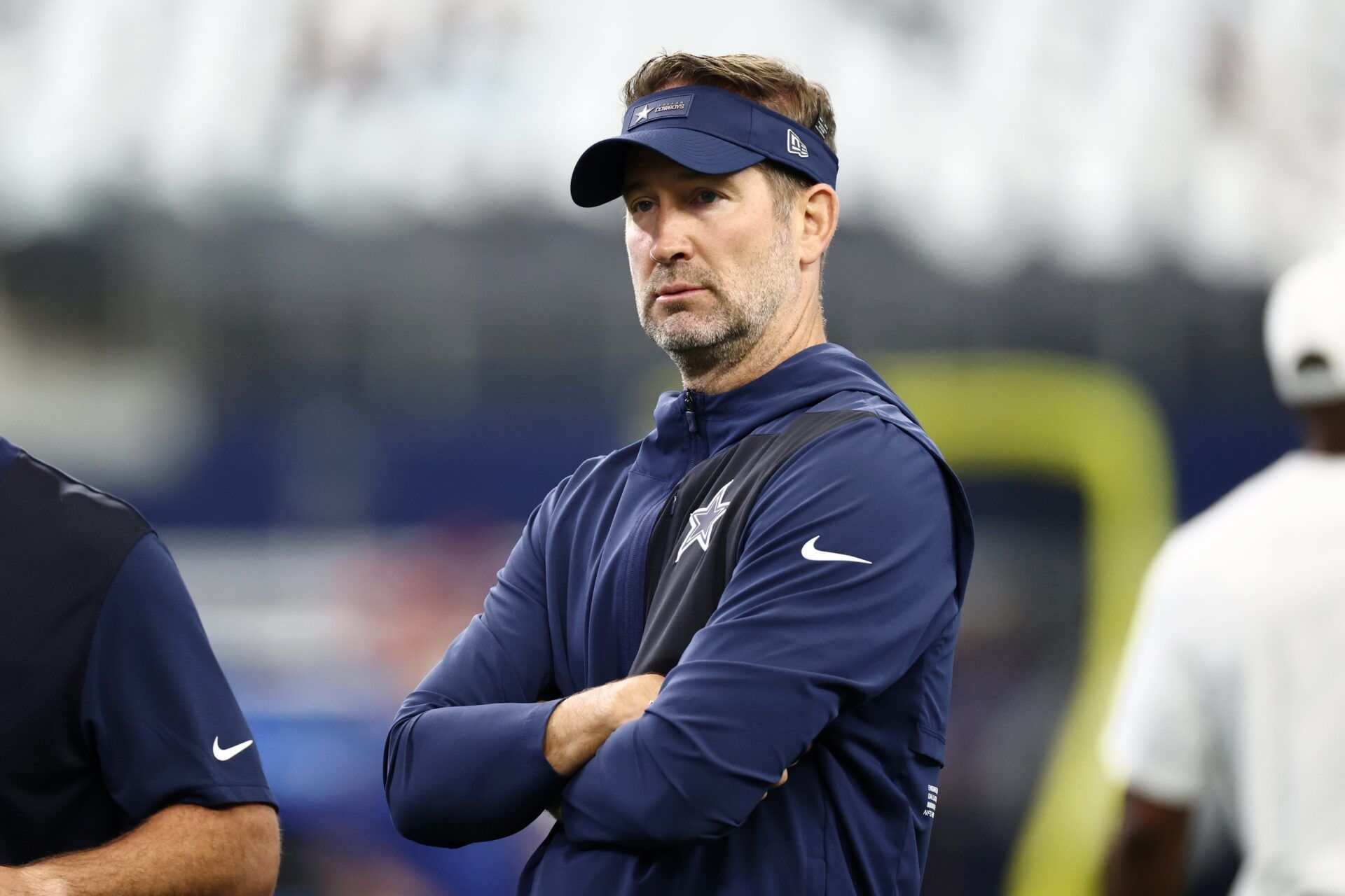 Dallas Cowboys head coach Brian Schottenheimer looks on during warmups before the game New York Giants at AT&T Stadium.