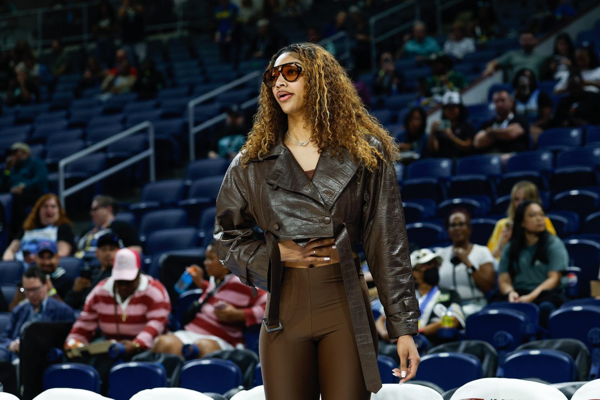 Injured Chicago Sky forward Angel Reese (5) stands on the sidelines before a WNBA game against the New York Liberty at Wintrust Arena.
