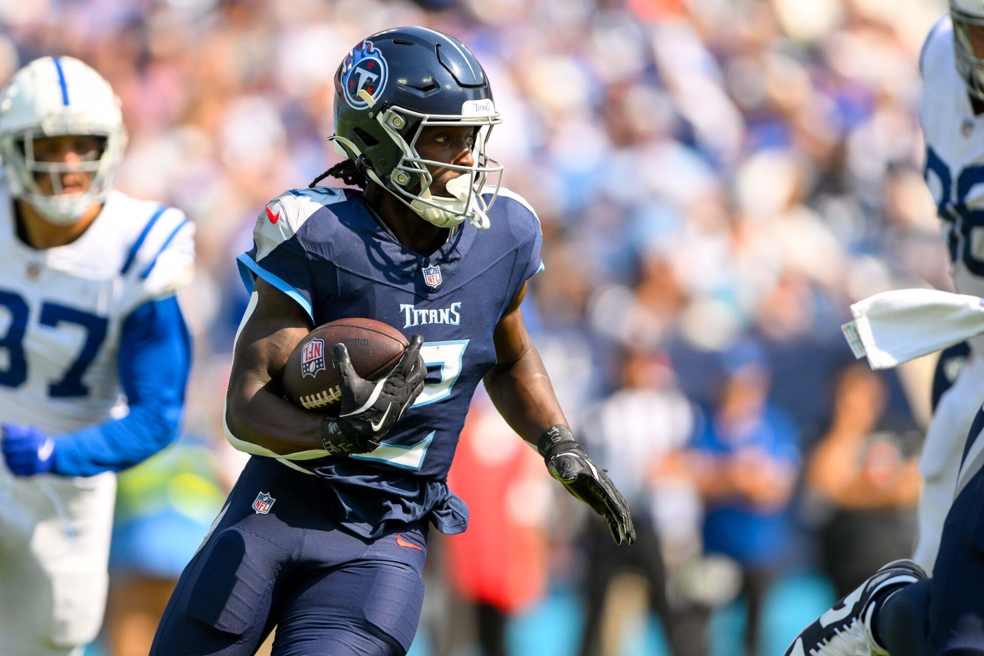 Tennessee Titans running back Tyjae Spears (2) runs the ball against the Indianapolis Colts during the first half at Nissan Stadium.
