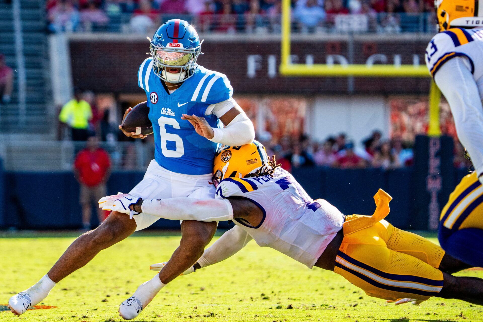 Ole Miss quarterback Trinidad Chambliss (6) carries the ball during a college football game between Ole Miss and LSU at Vaught-Hemingway Stadium in Oxford, Miss., on Saturday, Sept. 27, 2025.
