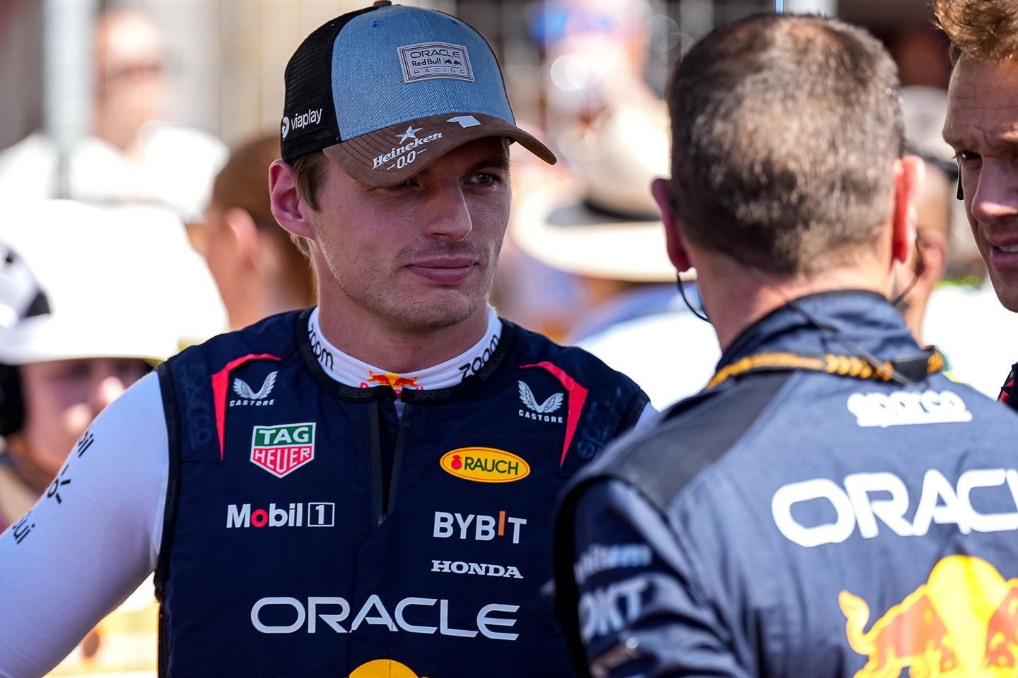 Oracle Red Bull Racing driver Max Verstappen talks to team mates at the starting grid at the Formula 1 Pirelli United States Grand Prix at Circuit of the Americas.