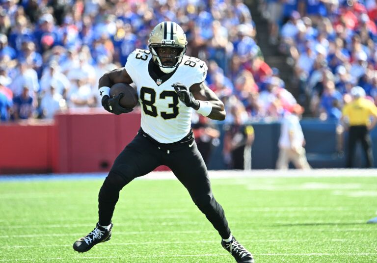 New Orleans Saints tight end Juwan Johnson (83) runs for a gain during the fourth quarter against the Buffalo Bills  at Highmark Stadium.
