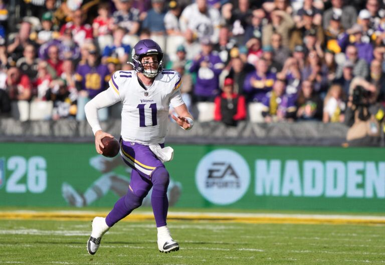 Minnesota Vikings quarterback Carson Wentz (11) runs for a gain during the third quarter against the Pittsburgh Steelers during an NFL International Series game at Croke Park.