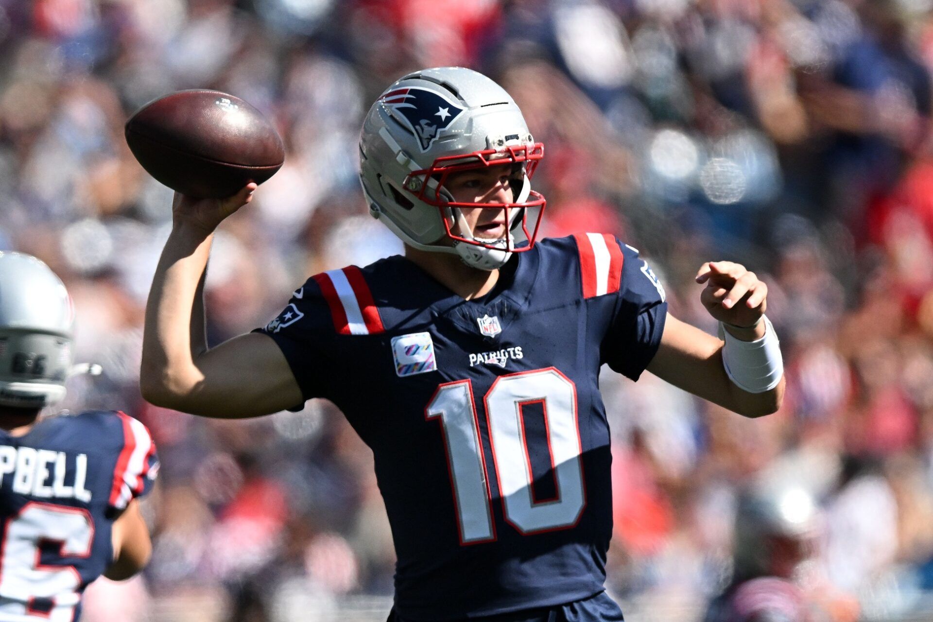 New England Patriots quarterback Drake Maye (10) looks to throw against the Carolina Panthers during the first half at Gillette Stadium.