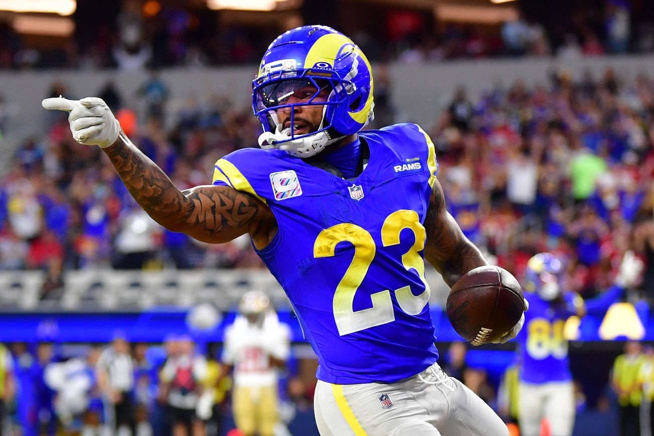 Los Angeles Rams running back Kyren Williams (23) reacts after rushing for a touchdown against the San Francisco 49ers during the first half at SoFi Stadium.