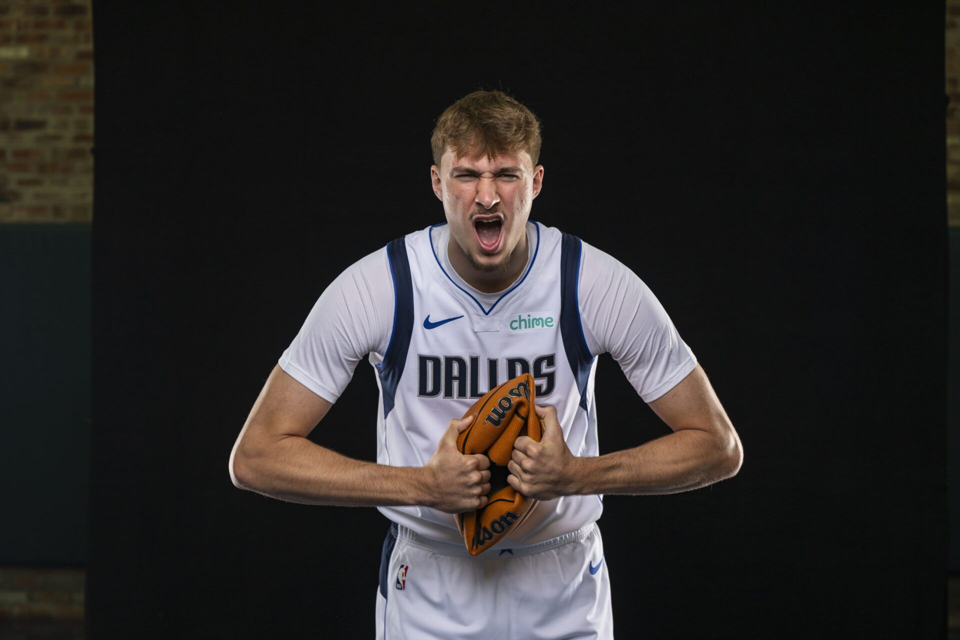Dallas Mavericks forward Cooper Flagg (32) poses for a photo during the Mavericks 2025 media day at the American Airlines Center.