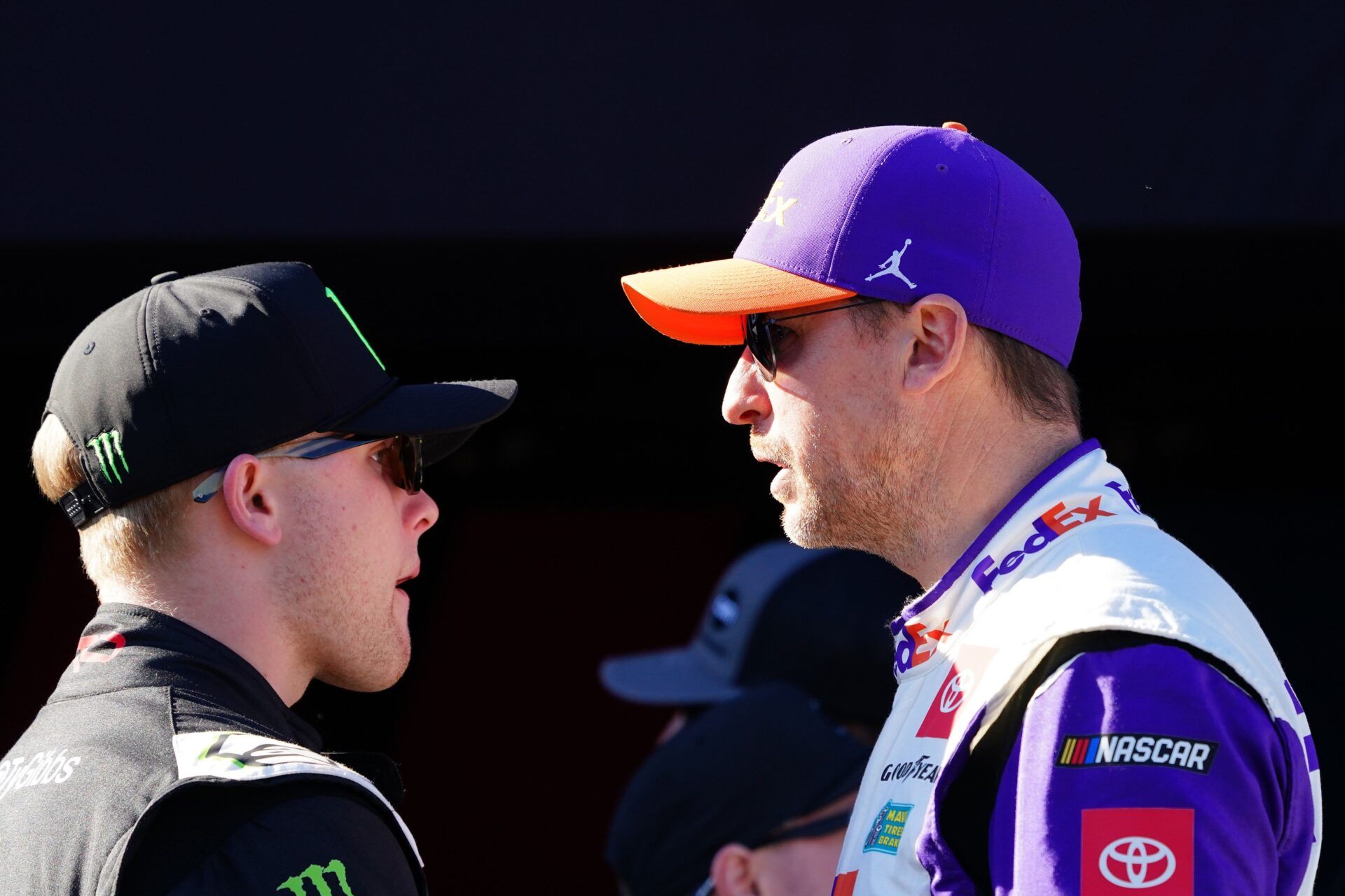 NASCAR Cup Series driver Denny Hamlin (11) and driver Ty Gibbs (54) talk during driver introductions before the Daytona 500 at Daytona International Speedway.
