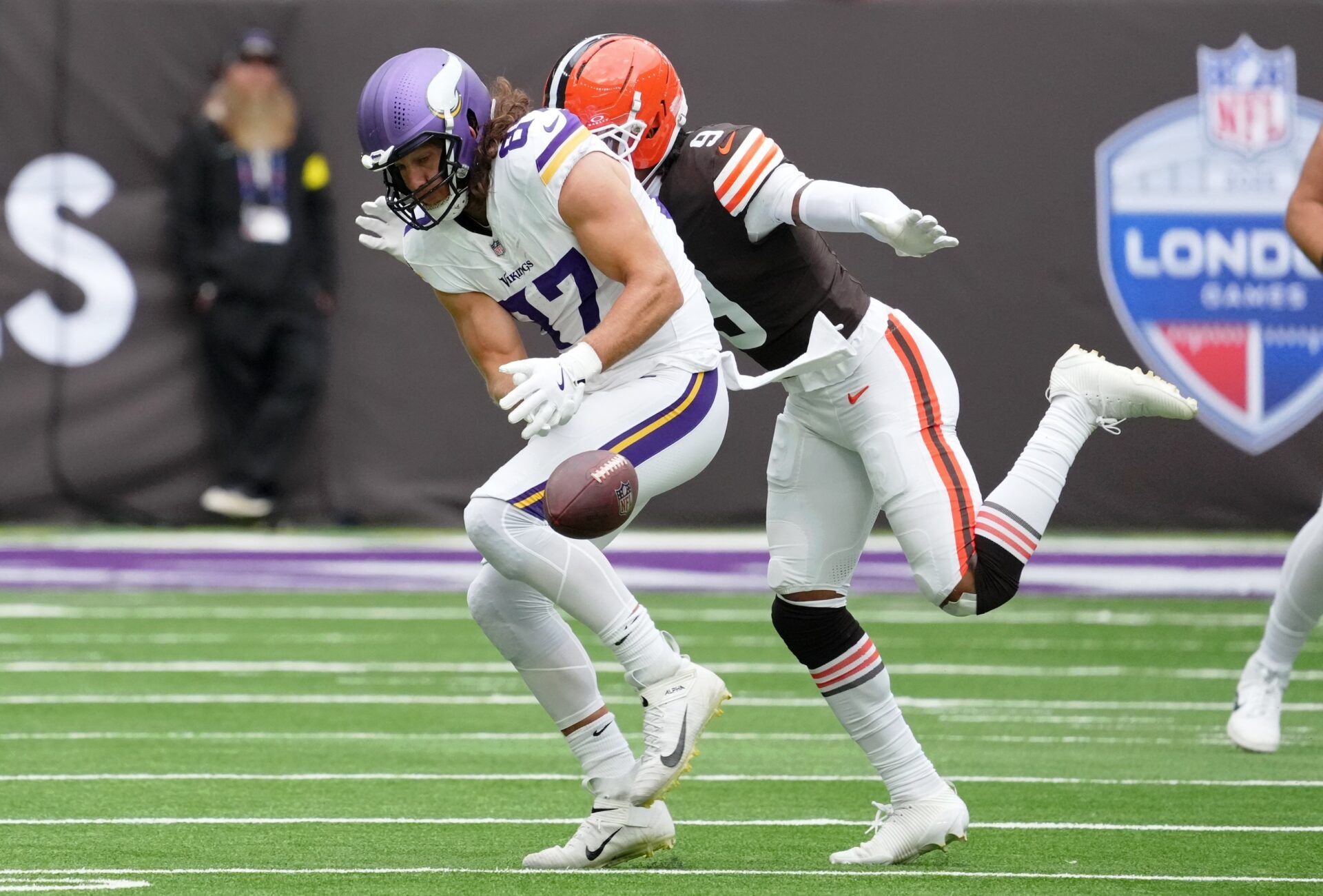 Minnesota Vikings tight end T.J. Hockenson (87) is unable to catch the ball while defended by Cleveland Browns safety Grant Delpit (9) during the second quarter of an NFL International Series game at Tottenham Hotspur Stadium.