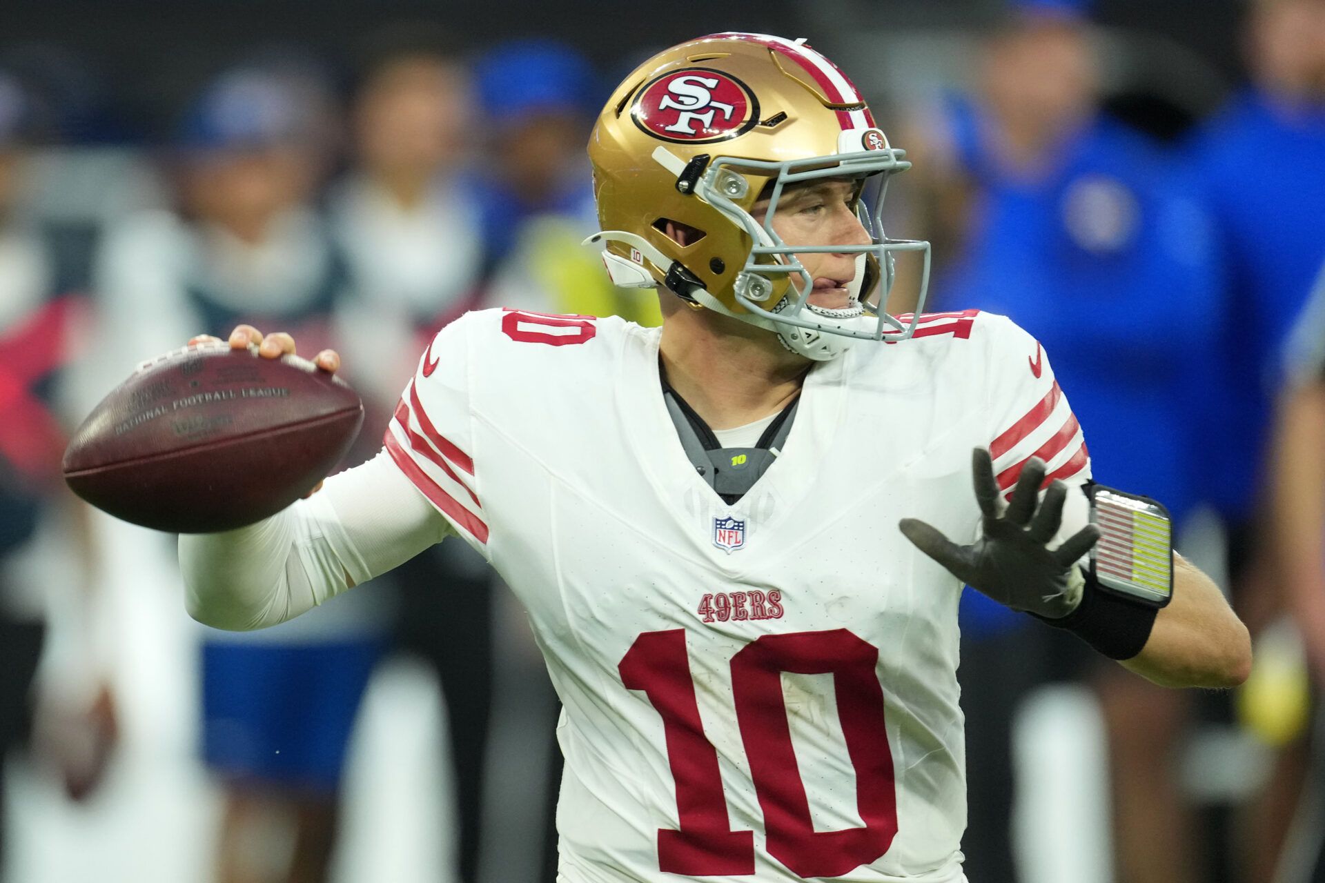 San Francisco 49ers quarterback Mac Jones (10) drops back to pass against the Los Angeles Rams during the first half at SoFi Stadium.
