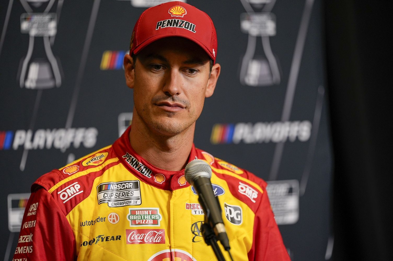 Joey Logano answers questions from the media during NASCAR Cup Series Playoff Media Day at Charlotte Convention Center.